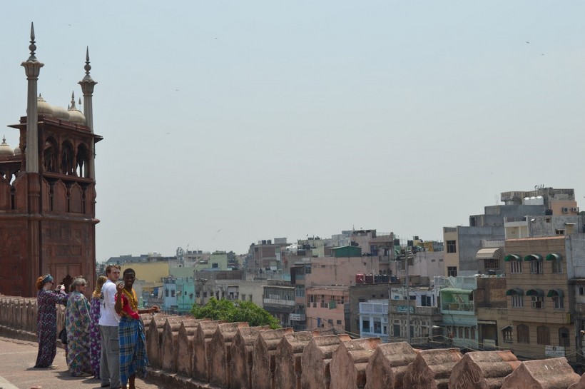 Students looking over a city in India