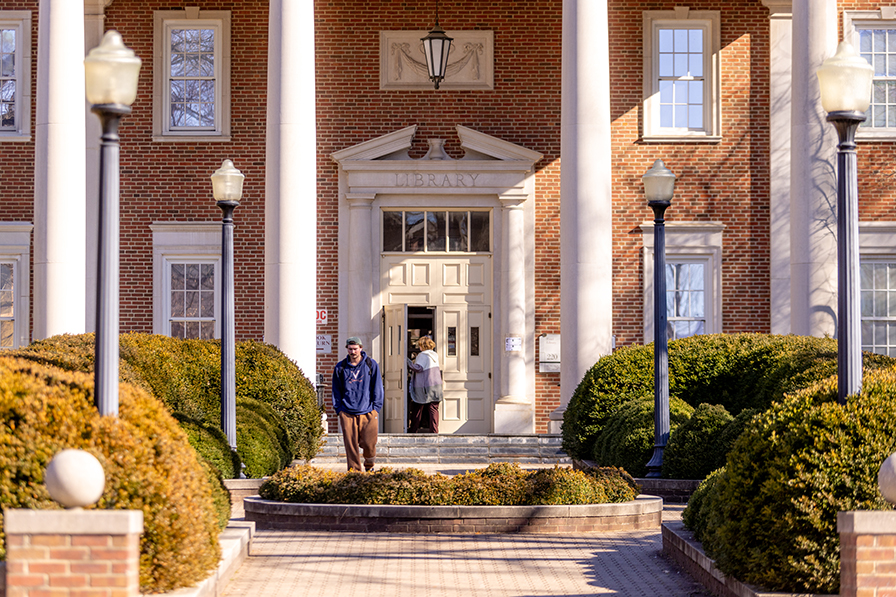 Student in front of Fintel Library