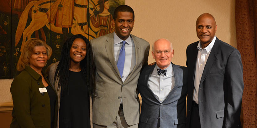 MLK day speaker Bakari Sellers poses for a photo with members of the Roanoke College community