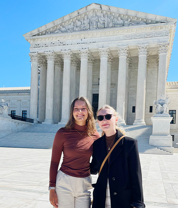 Kylee Miller in front of the Supreme Court