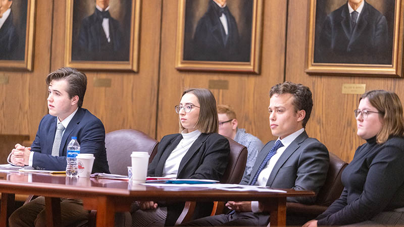 student speaking in a court room 