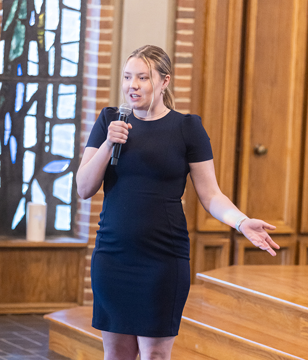 Hope Keller, speaking with a microphone