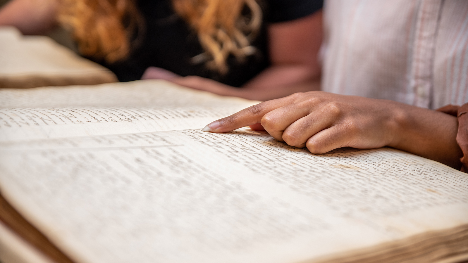 hand on a book