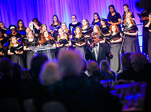 oriana singers on stage singing