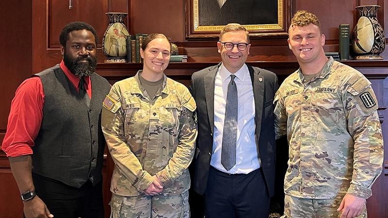 Members of the military at Roanoke College with President Shushok