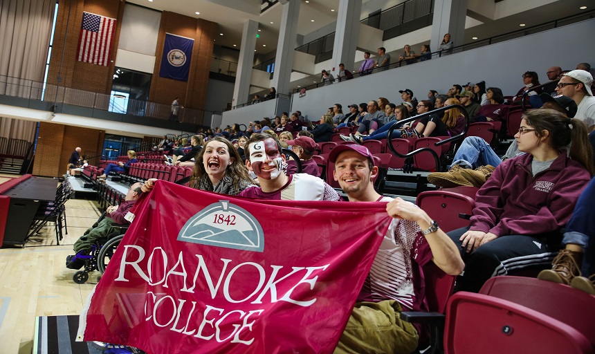 Seniors holding RC banner