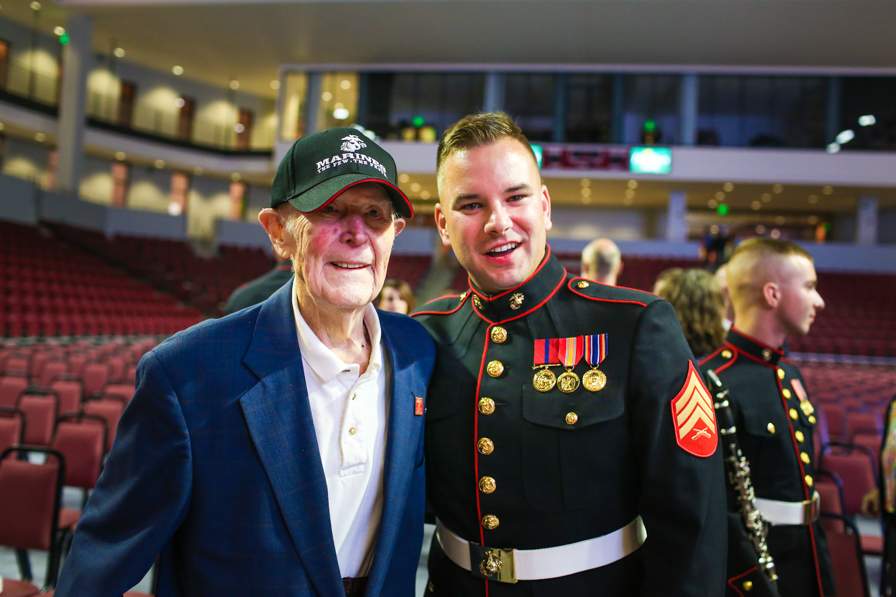 two veterans smiling