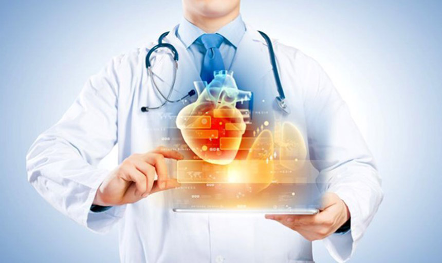 image of a doctor holding a heart graphic