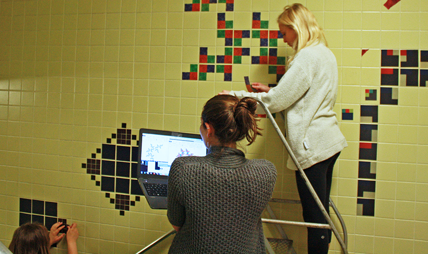 students measuring each others heart rates