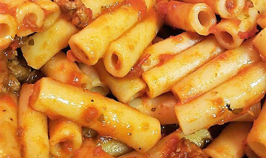 A picture of pasta with sauce