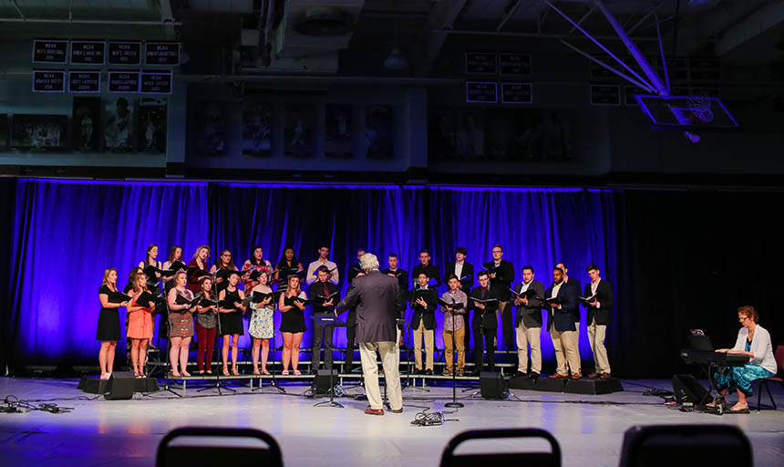 The choir performing under the direction of Dr. Sandborg