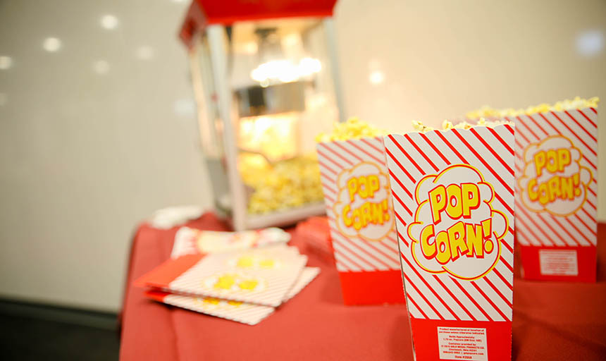 A table with some popcorn bags on it