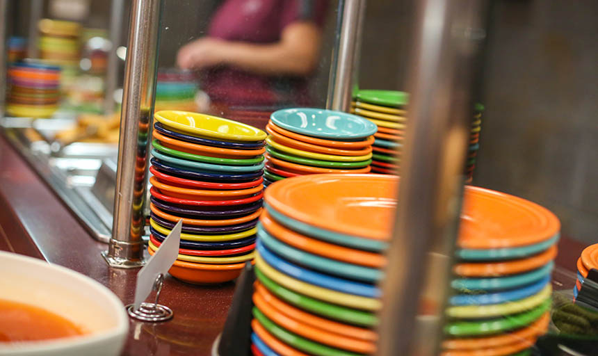 A stack of colorful plates in Commons