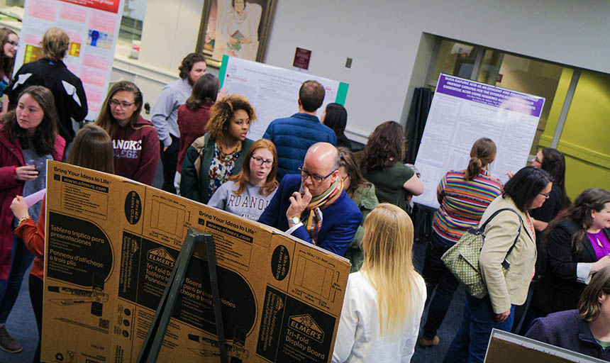 students and their families at the showcase of research and creativity