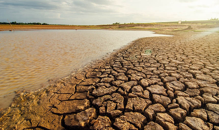 dry land and a pool of water