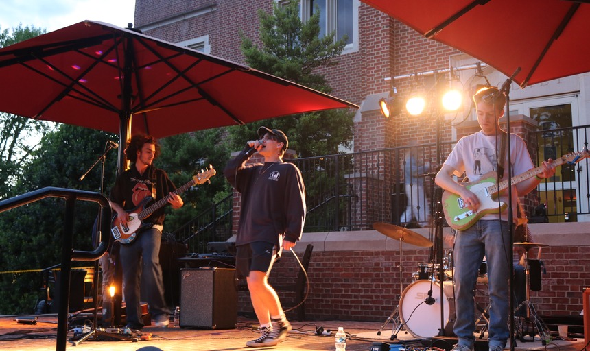 A band playing on the stage outside the Colket Center