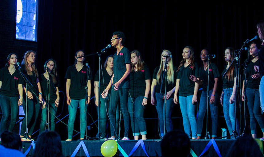 An a cappella group performing at a concert