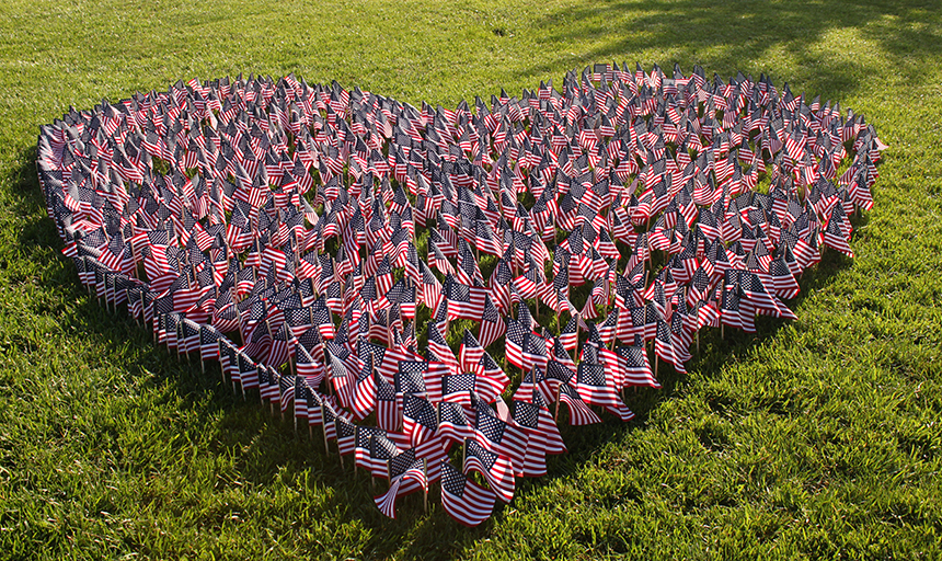 flags placed in shape of a heart