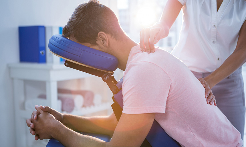 stock image of a person in a massage chair