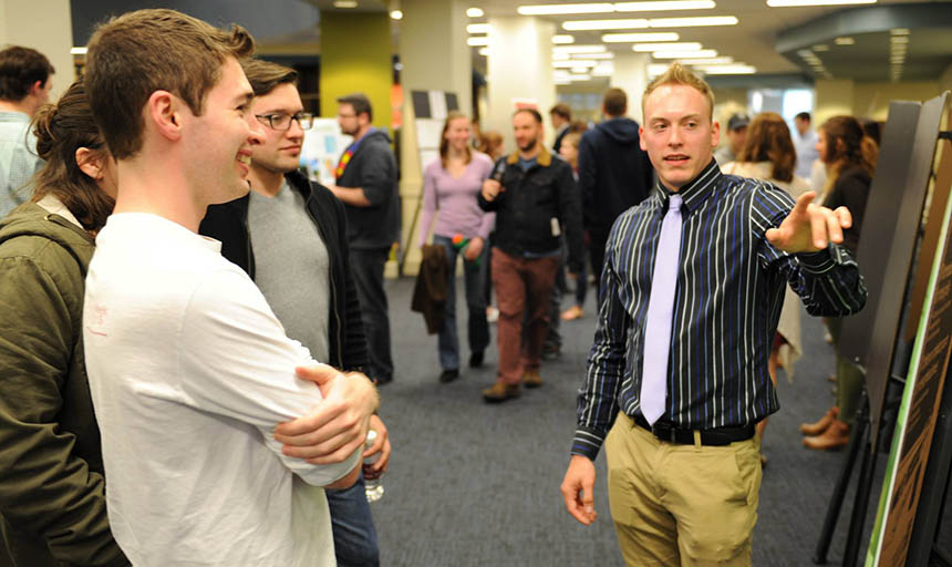 Students at a poster showcase