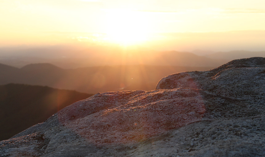 Photo of a sunlit overlook at McAfee Knob