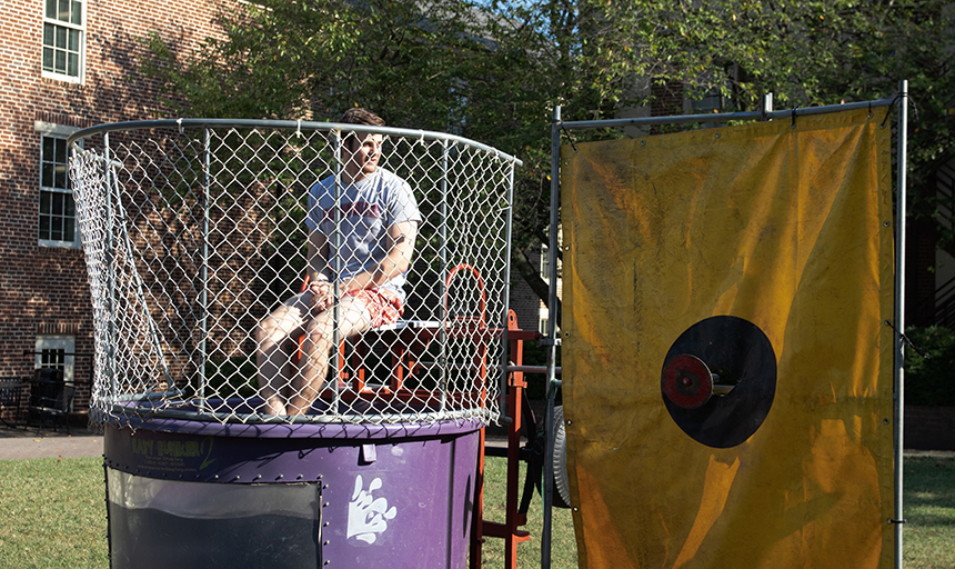 student in a dunk tank