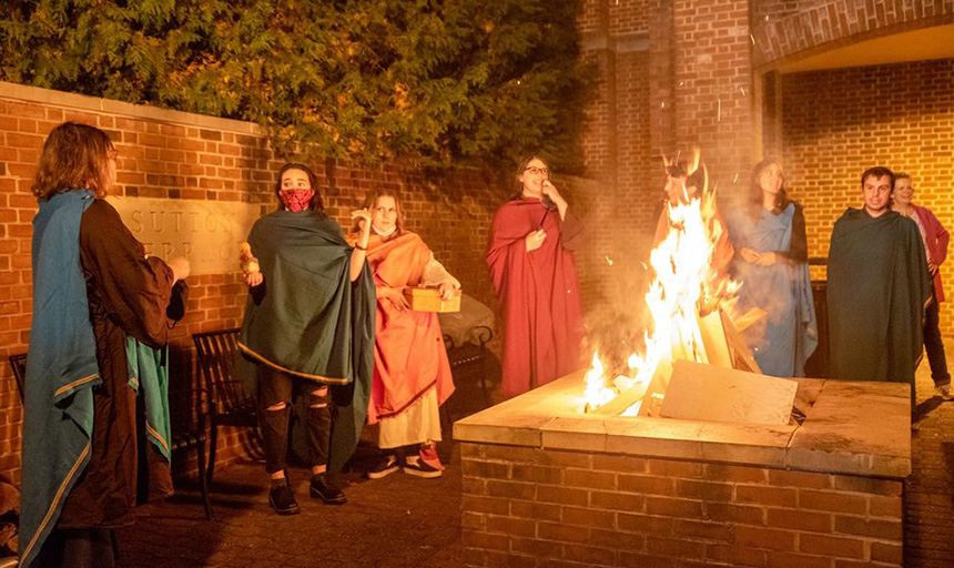 Students at a bonfire 