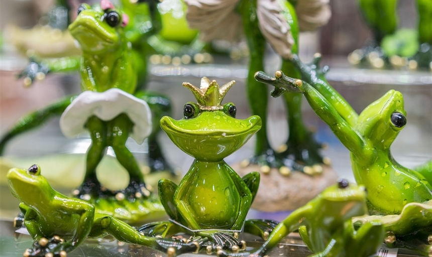 Frogs with crowns dancing on Lilly Pad