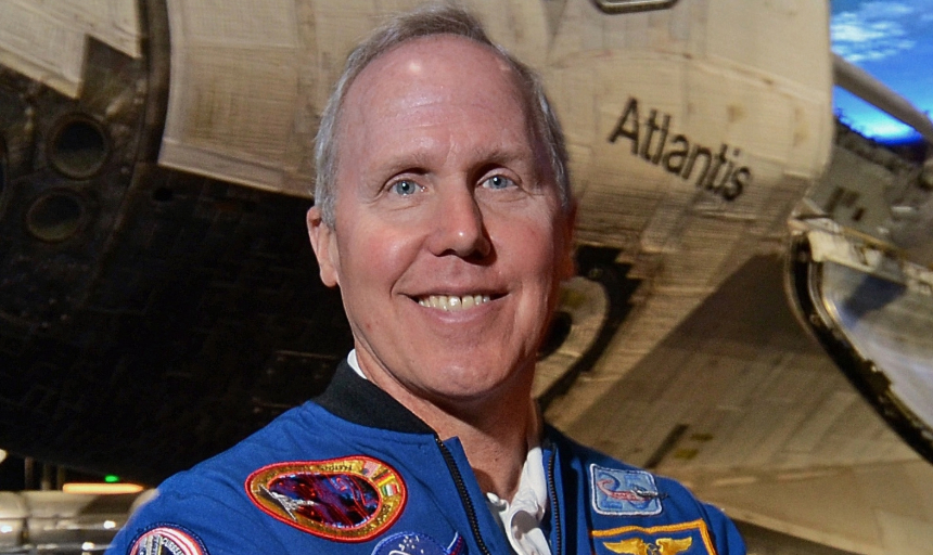 A photo of Dr. Tom Jones in a NASA jacket