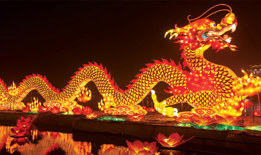  A lighted float in the shape of a dragon 