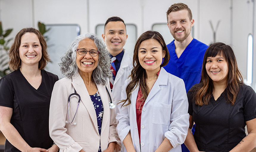 Group photo of healthcare clinicians and administrators