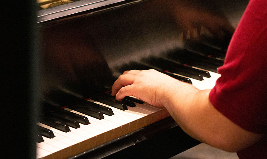 Person playing the Piano