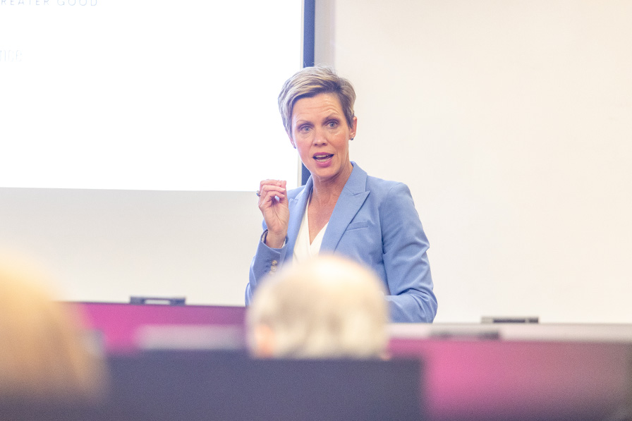 Professor teaching a class in a computer lab.