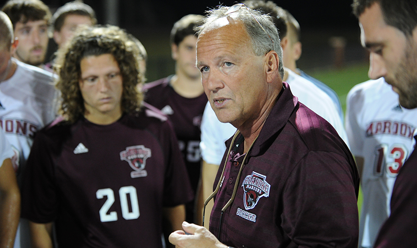 Coach Allison offers words of wisdom to the men’s soccer team in 2011.