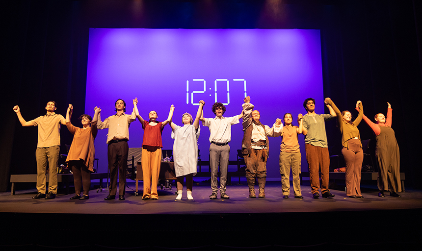 A row of actors prepare to take a bow during the final curtain call of "A Monster Calls"