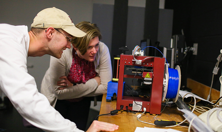 Liam Lambert and Dr. Karin Saoub at 3D printer