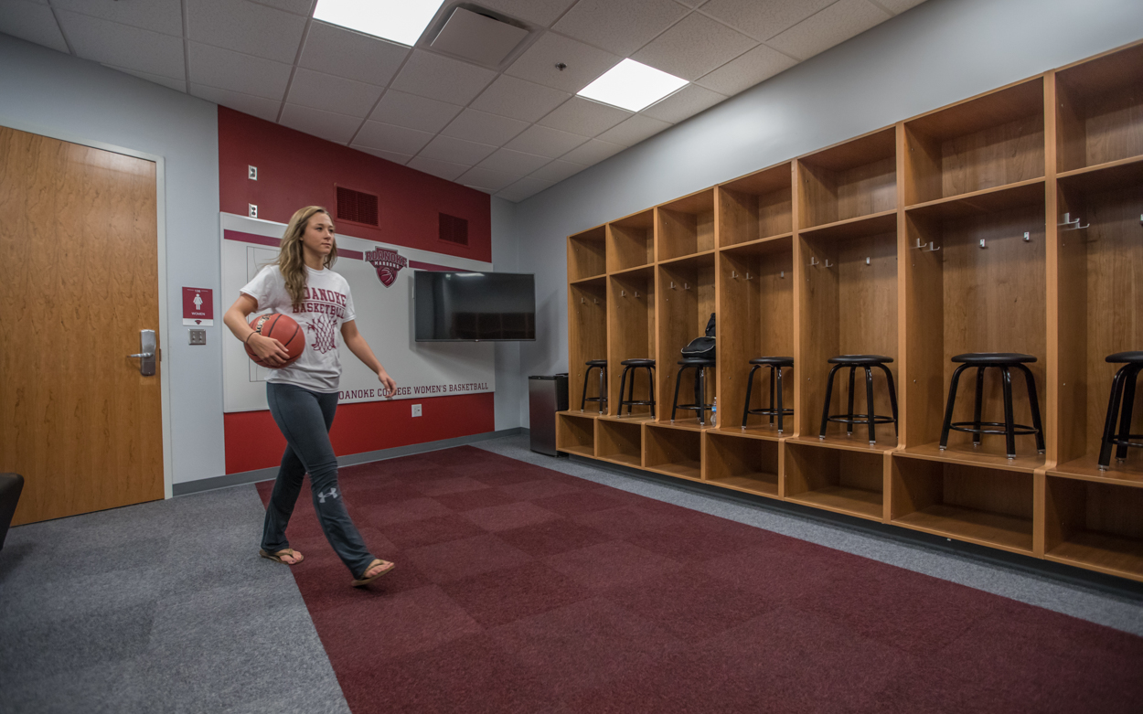 A student walking in the Cregger Center womens' locker room