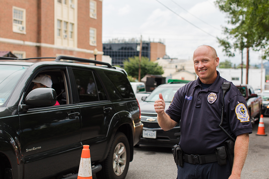 Campus safety officer giving a thumbs-up